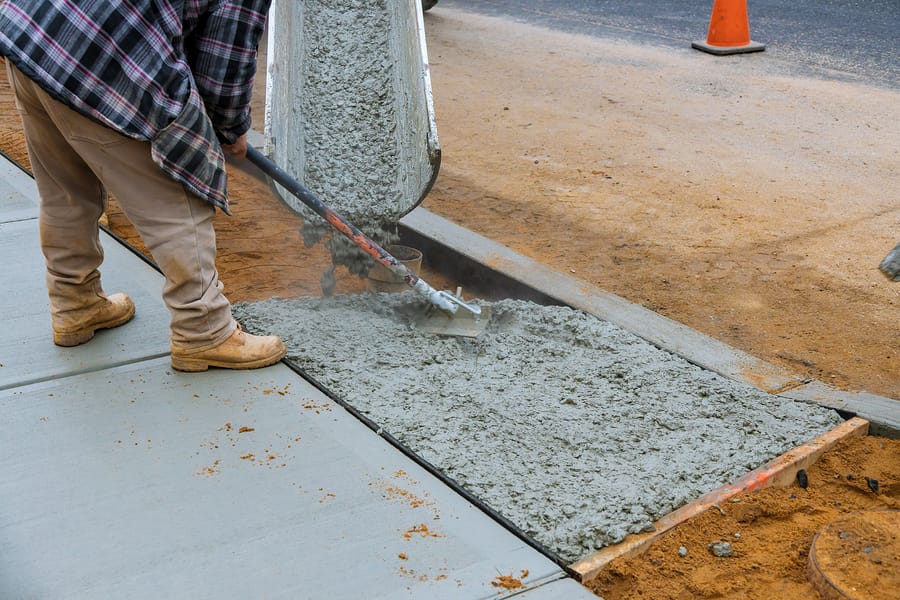 truck pouring the cement in the floor