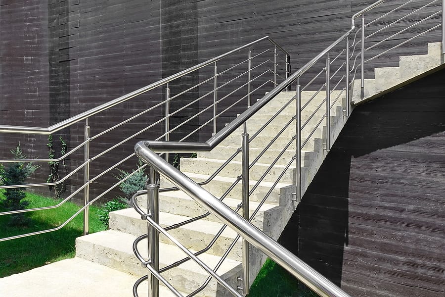 outdoor cement staircase with railings